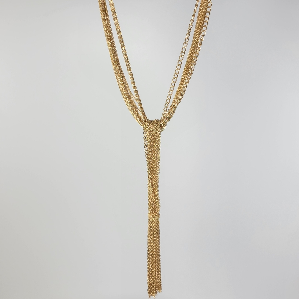 New. Multi layer necklace. Yellow gold. 15"